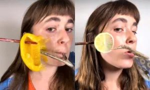 Nghệ sĩ vẽ tác phẩm 3D trên mặt bằng miệng